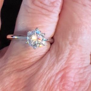 Ladies Solitaire and Silver Ring